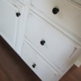 Finished with distressing and new knobs
